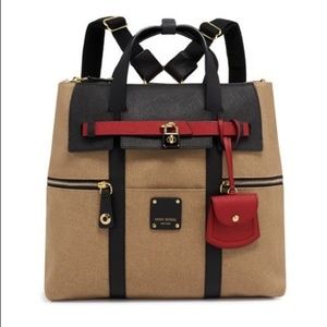 ISO NOT SELLING LARGE JETSETTER BROWN W RED ACCENT